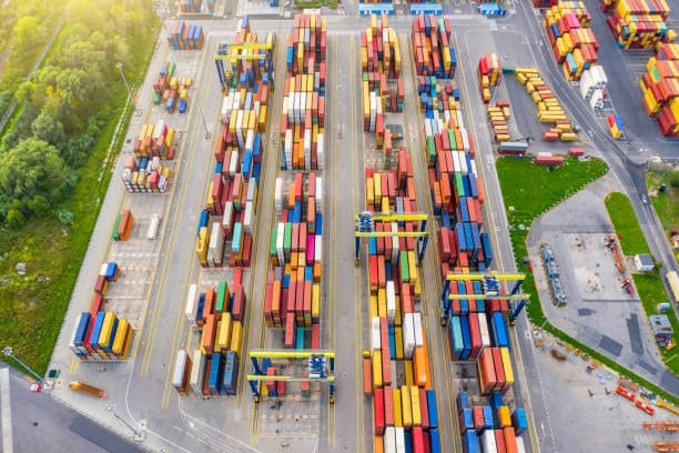 Aerial view of container yard organizing freight for shipping from Germany to the USA.
