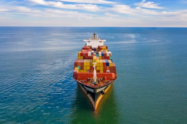 Container vessel heading across the Atlantic on the Germany to USA shipping route.