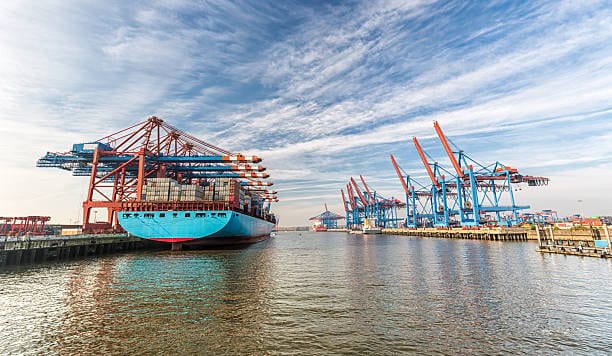 Cargo ship at German port being loaded for shipment to the United States.
