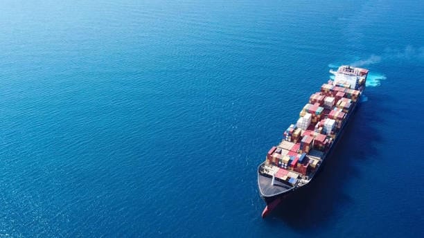 Container vessel cruising across open ocean, representing the sea freight transit phase of shipping from China to global destinations.