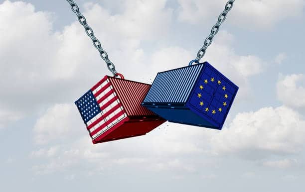 Shipping containers with USA and EU flags crashing, symbolizing trade tension and logistics challenges.