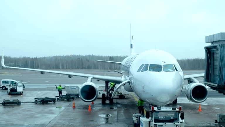 Air cargo loading operations representing international courier from USA to India.