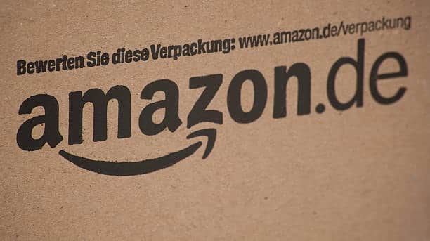 Amazon Germany box showing packaging feedback link as part of compliance requirements.