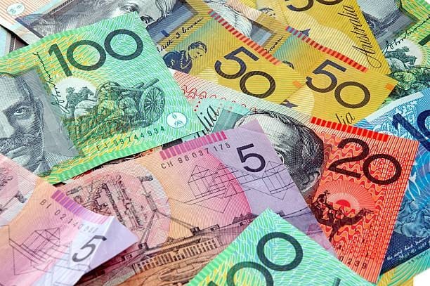Assortment of Australian dollar notes, symbolizing the financial cost of GST and import duty on shipments to Australia.
