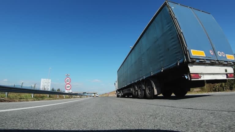 Cargo truck on highway representing inland transport covered by seller in CPT agreement.