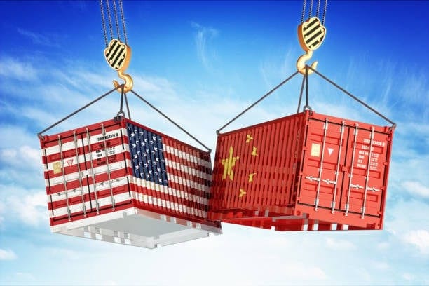 Shipping containers with US and Chinese flags symbolizing bilateral trade and customs regulations for importing goods.