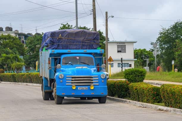 Truck transporting goods for cross-border ground shipping from Canada to the US.