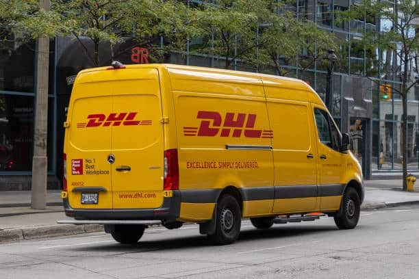 DHL Express van on city street, highlighting last-mile delivery services between China and the US.