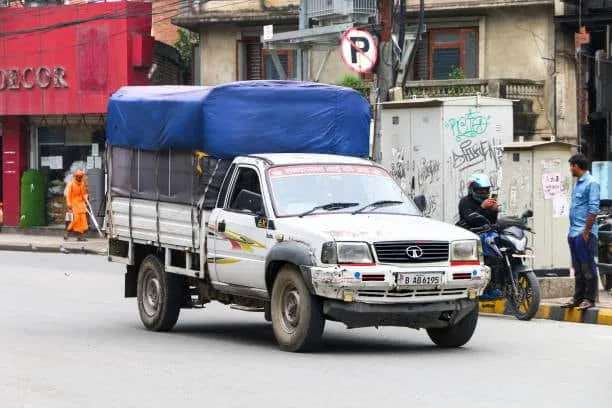 Local truck used for picking up goods under Ex Works agreement.
