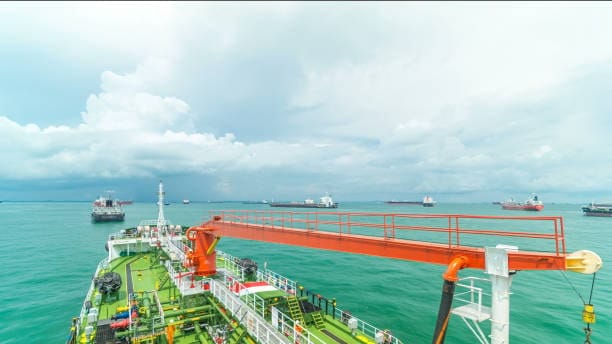 Marine freight vessel navigating ocean routes for shipping from Canada to the United States.