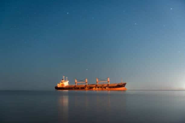 Cargo ship transporting goods by ocean freight from Canada to the United States.