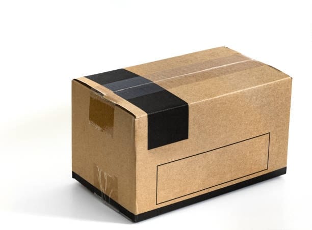 Generic brown box with black tape and no visible label, example of incomplete shipping compliance".