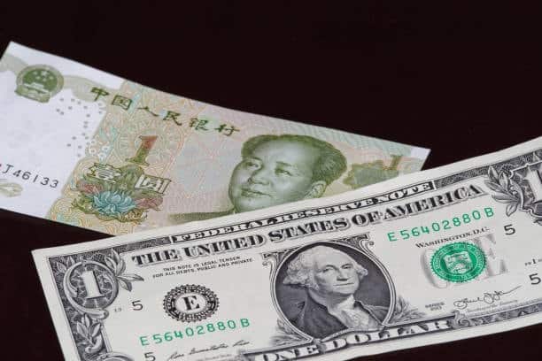 Side-by-side image of Chinese RMB and US Dollar indicating customs duty calculations for China to US shipments.