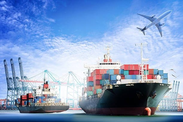 Container ships and airplane at port highlighting international shipping logistics