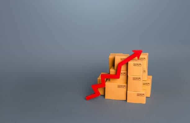 Rising import costs represented by stacked boxes and a red arrow for Japan shipments.
