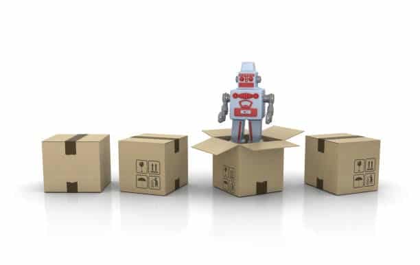 Toy robot emerging from packaging, symbolizing toy import inspections.